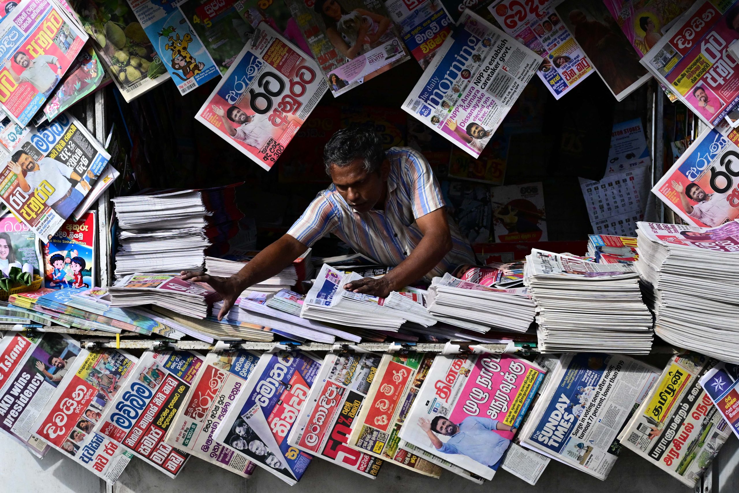 AFP__20240923__36GR9BX__v1__HighRes__SriLankaPoliticsVote-min