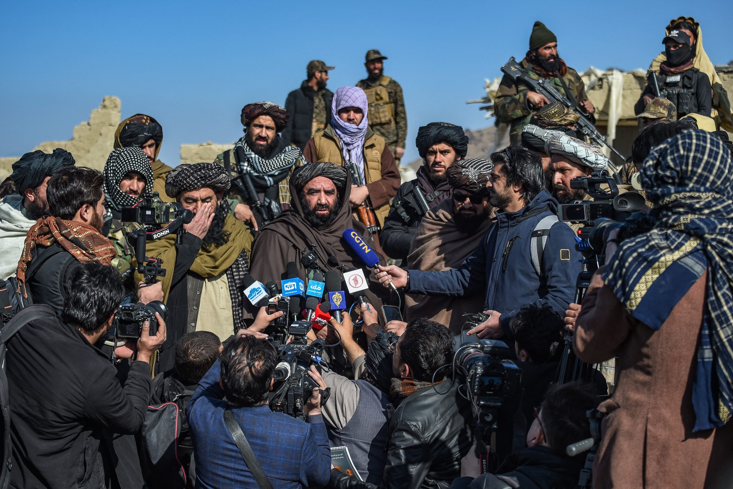 AFP__20241226__36RJ2M2__v1__HighRes__AfghanistanPakistanStrikes-min Channel 13 cameraman tackled to ground by riot police Feb 19 protest.